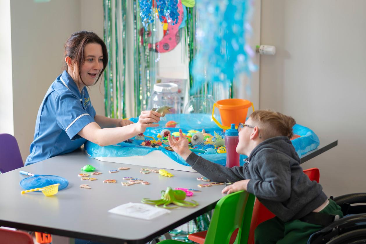 Rebecca House Children's Hospice nurse and child